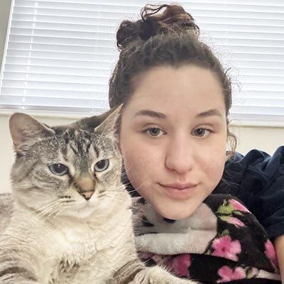 cat-sitter-in-jensen-beach Jensen Beach cat sitter with her cat